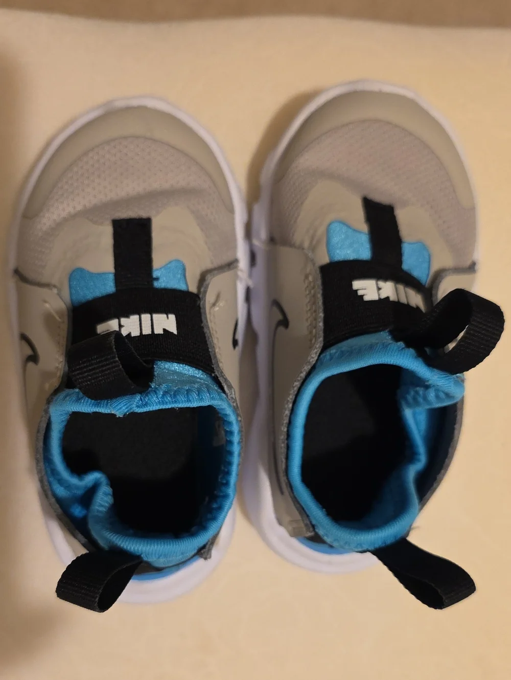 Nike Toddler Gray and Blue Slip-On Sneakers